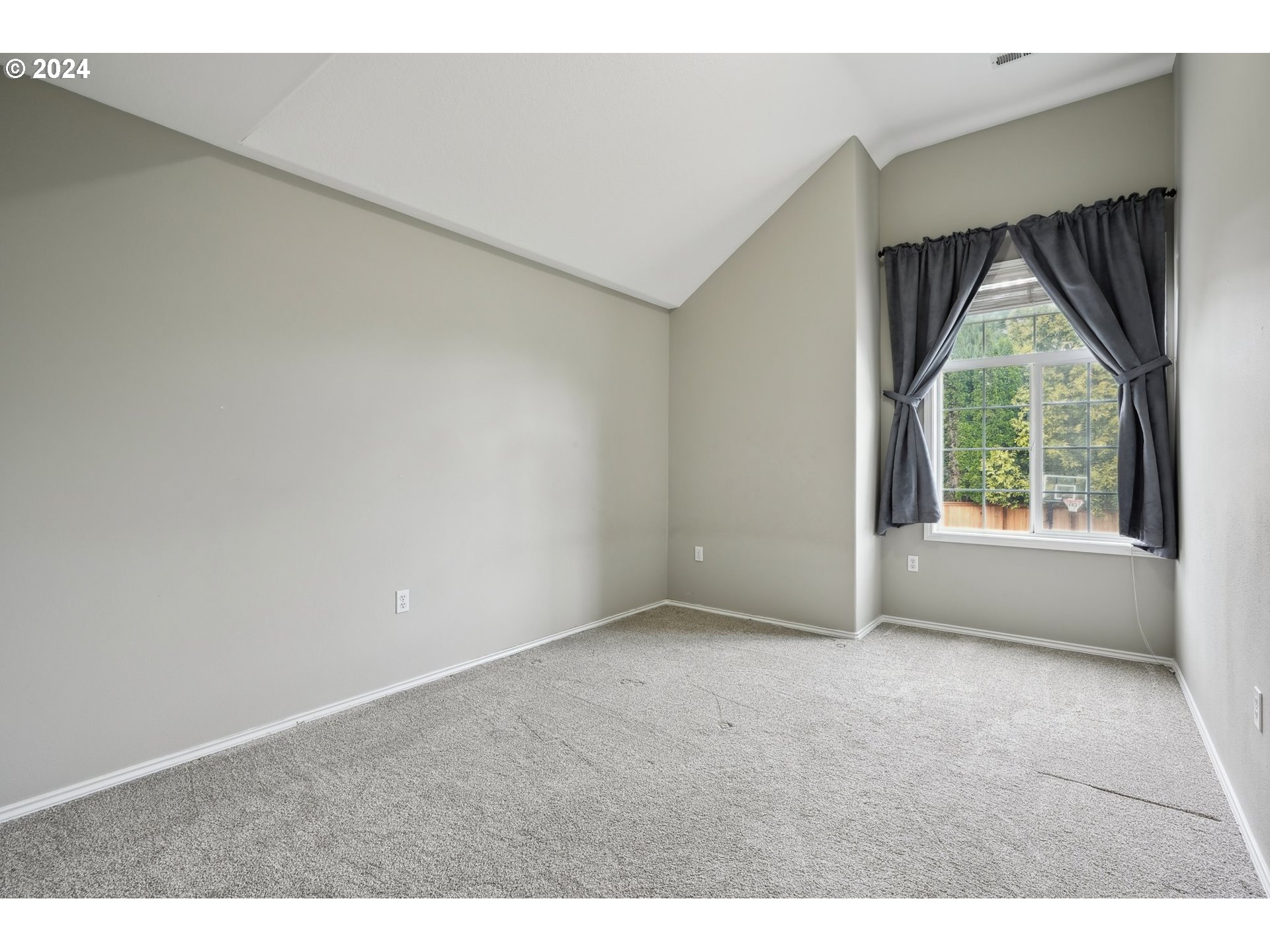 9267 Southwest 83rd Place Portland, OR 97223 - Photo 32 of 44 a view of an empty room with a window