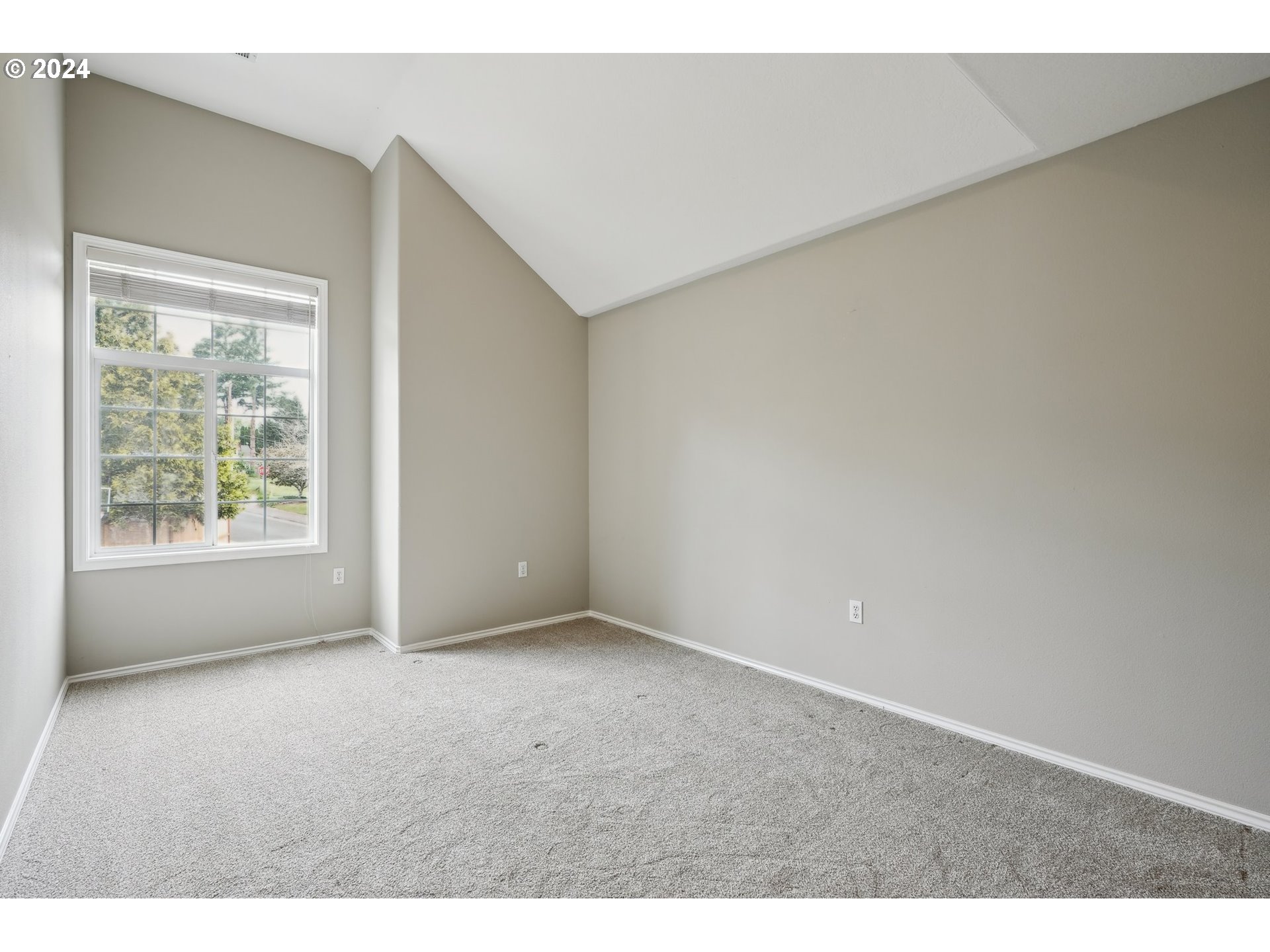9267 Southwest 83rd Place Portland, OR 97223 - Photo 34 of 44 a view of an empty room with a window