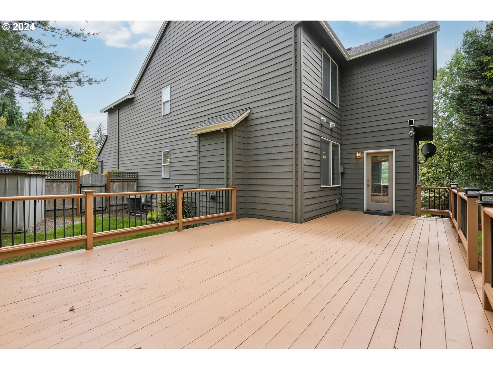 9267 Southwest 83rd Place Portland, OR 97223 - Photo 38 of 44 a view of backyard with a small deck