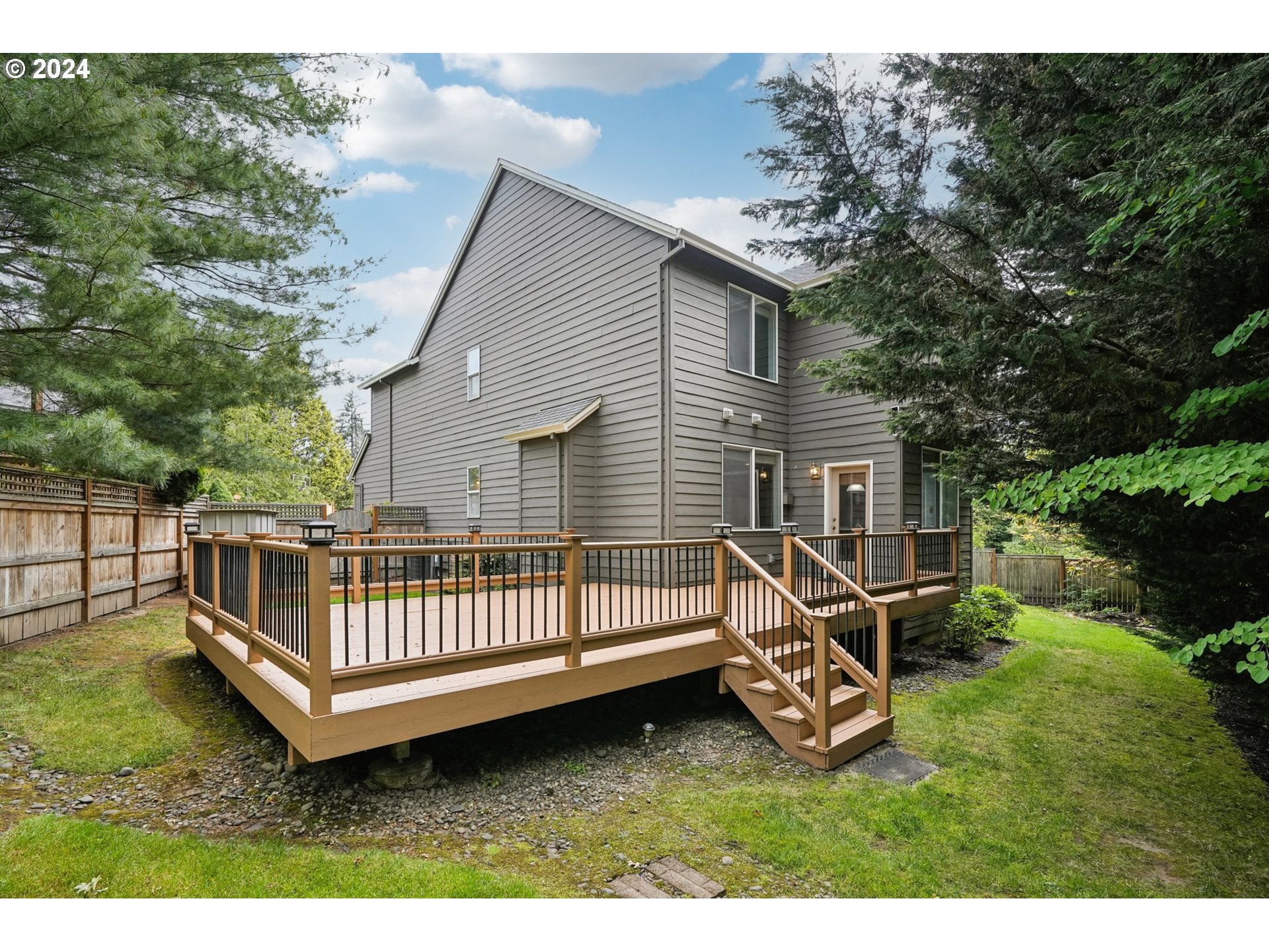 9267 Southwest 83rd Place Portland, OR 97223 - Photo 39 of 44 a view of backyard with deck and garden