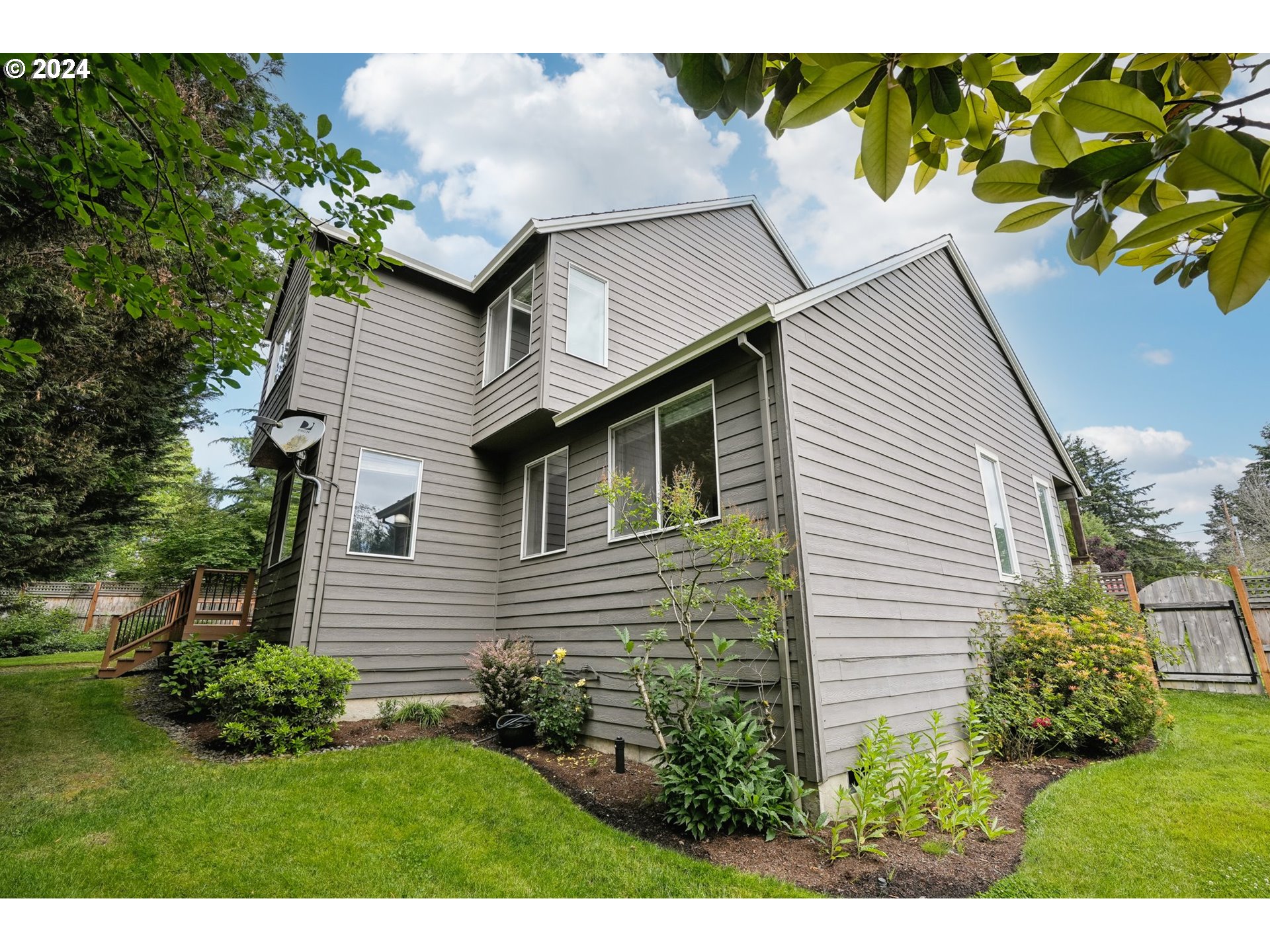 9267 Southwest 83rd Place Portland, OR 97223 - Photo 40 of 44 a view of a house with a yard