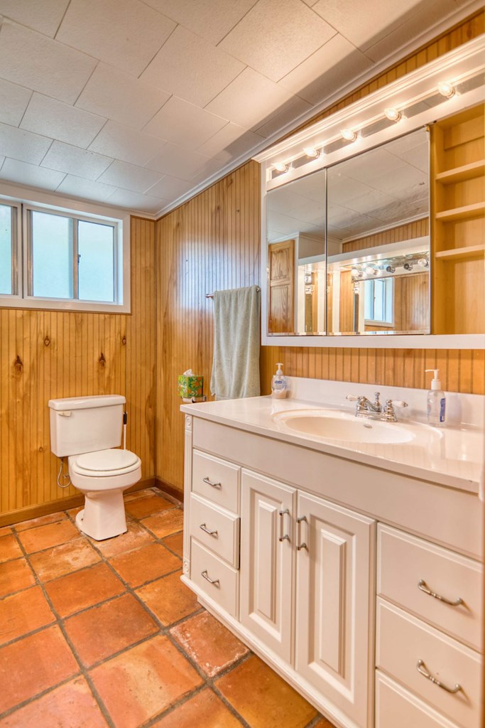 511 East Rainey Street Mason, TX 76856 - Photo 17 of 63 a spacious bathroom with a double vanity sink toilet and a tub
