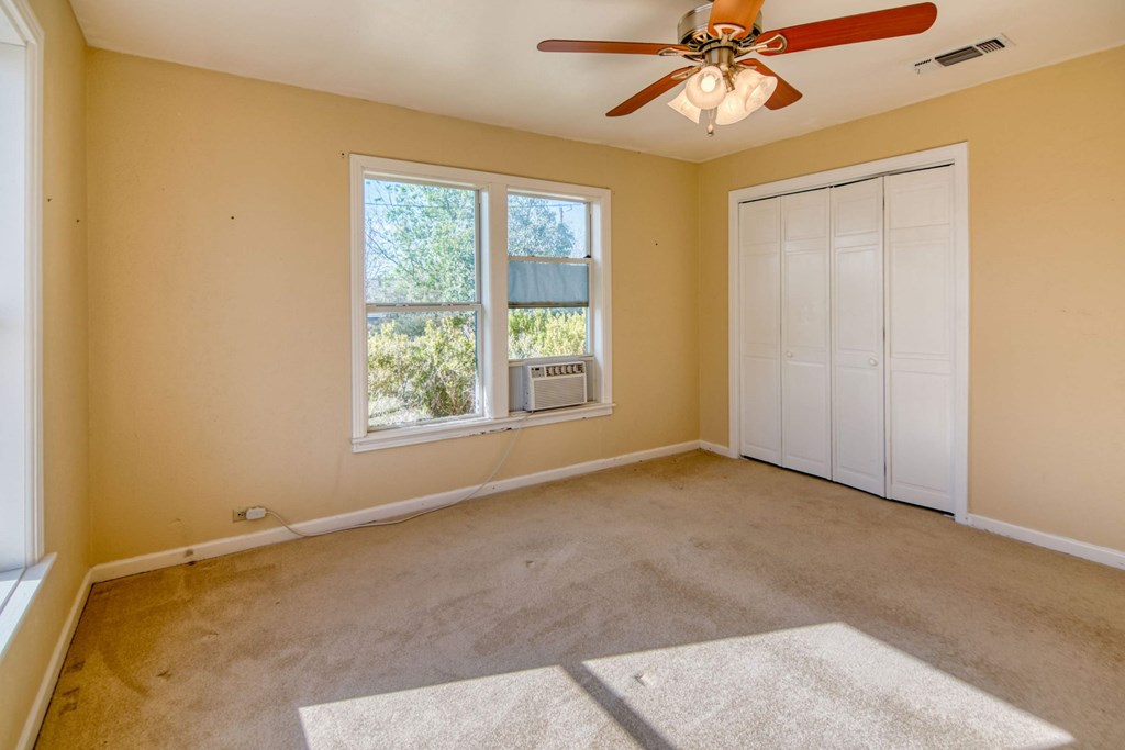 511 East Rainey Street Mason, TX 76856 - Photo 19 of 63 a view of an empty room with a window