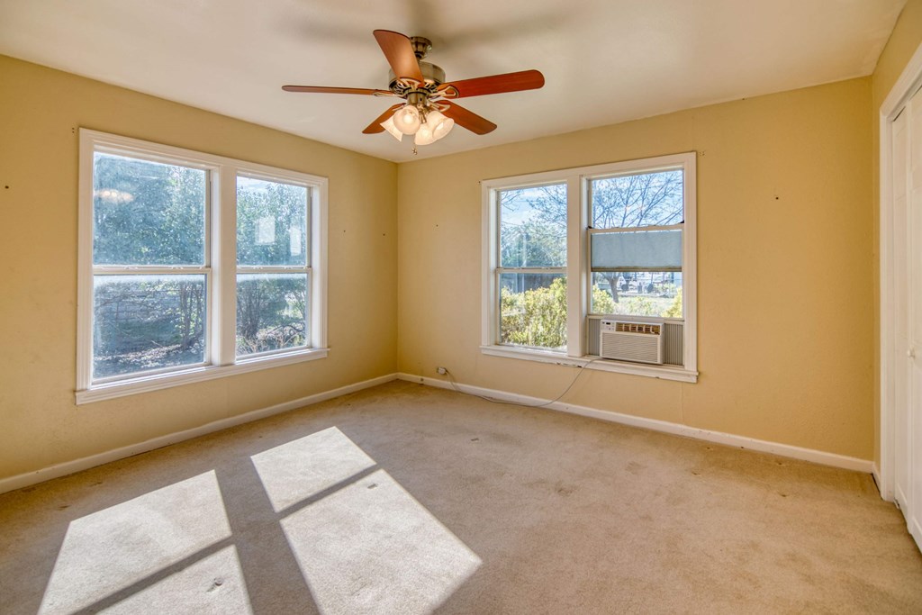 511 East Rainey Street Mason, TX 76856 - Photo 20 of 63 a view of an empty room with a window
