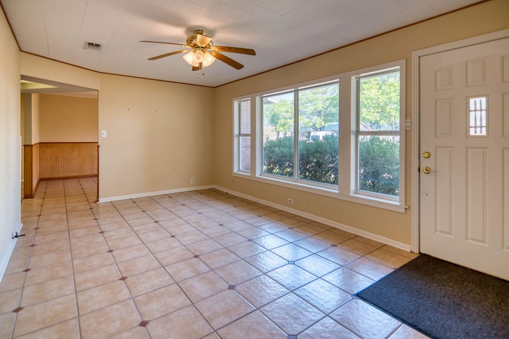 511 East Rainey Street Mason, TX 76856 - Photo 3 of 63 a view of an empty room with a window