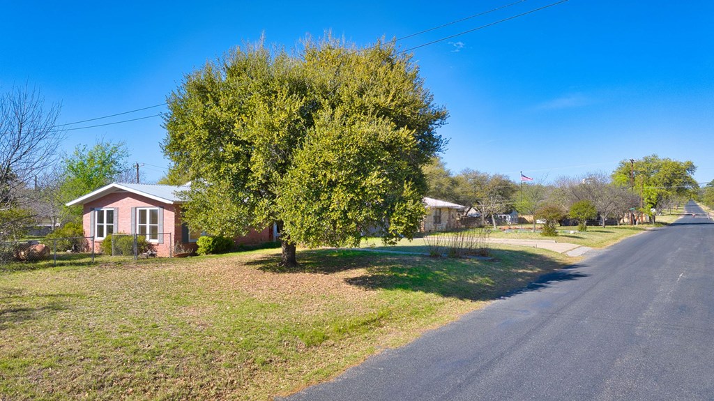 511 East Rainey Street Mason, TX 76856 - Photo 33 of 63 a view of a house with a yard