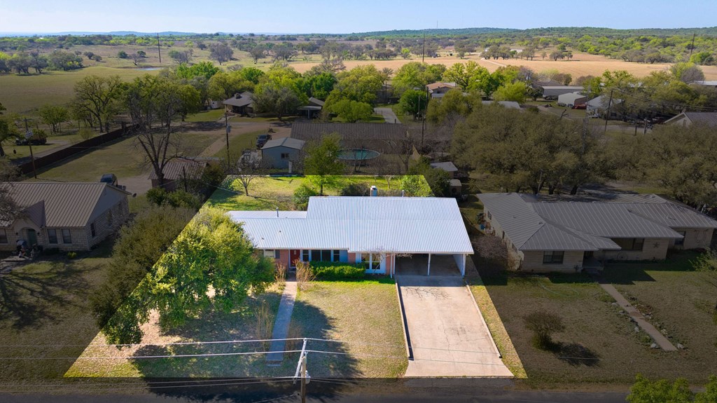 511 East Rainey Street Mason, TX 76856 - Photo 46 of 63 an aerial view of a house with a yard and lake view