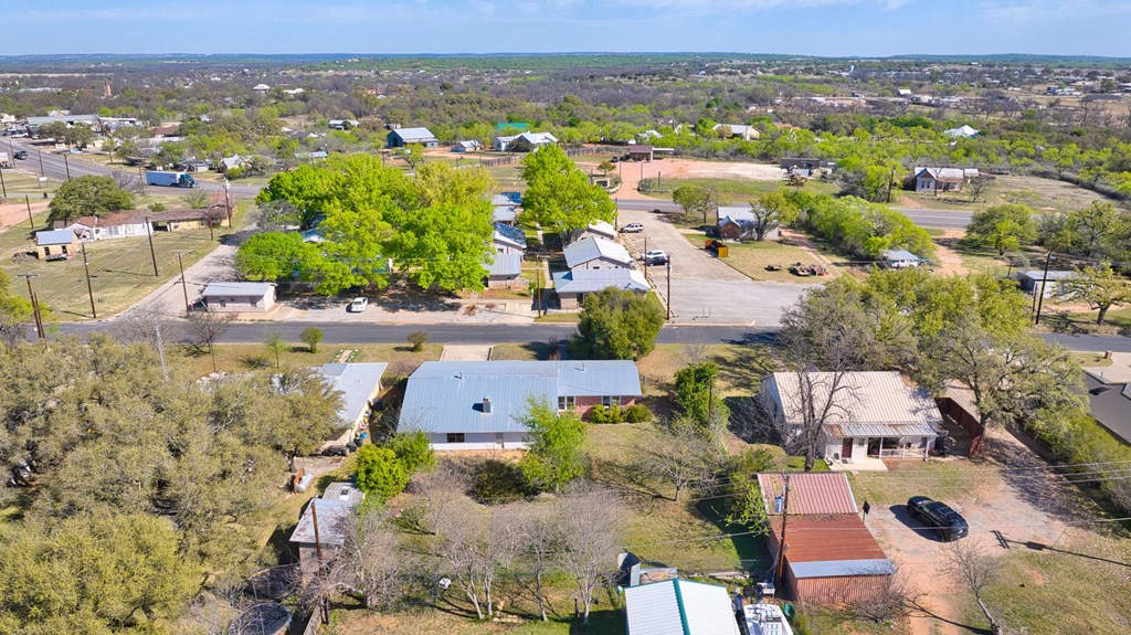 511 East Rainey Street Mason, TX 76856 - Photo 52 of 63 an aerial view of residential houses with outdoor space