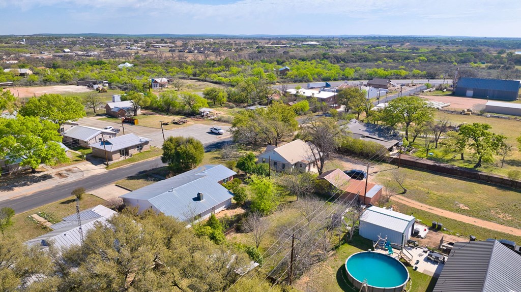 511 East Rainey Street Mason, TX 76856 - Photo 54 of 63 an aerial view of a house with yard swimming pool and outdoor seating
