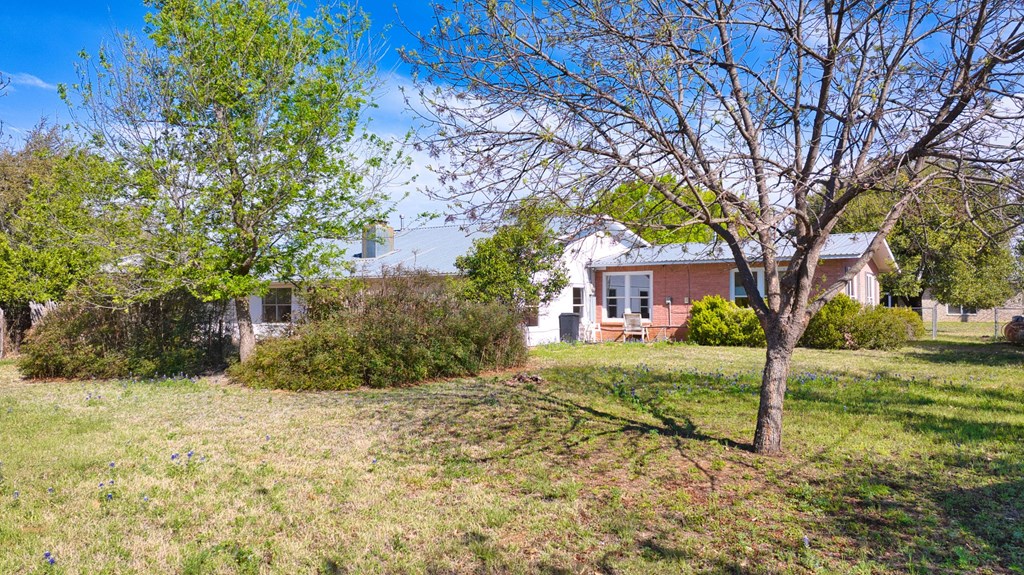 511 East Rainey Street Mason, TX 76856 - Photo 56 of 63 a view of a house with a yard