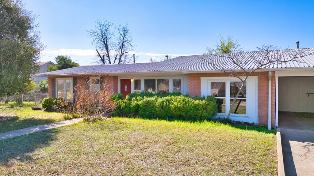 511 East Rainey Street Mason, TX 76856 - Photo 58 of 63 a front view of a house with a yard