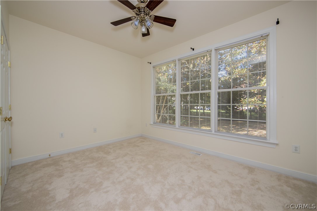 846 Club Ridge Terrace Chester, VA 23836 - Photo 11 of 35 a view of an empty room with a window