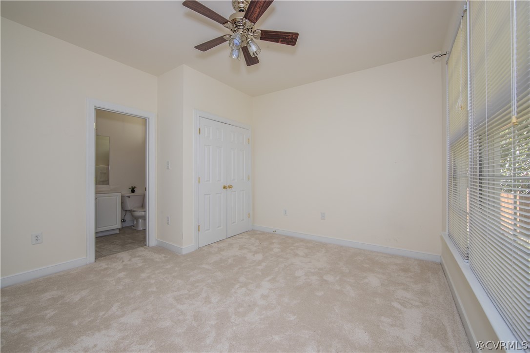 846 Club Ridge Terrace Chester, VA 23836 - Photo 12 of 35 an empty room with windows and fan