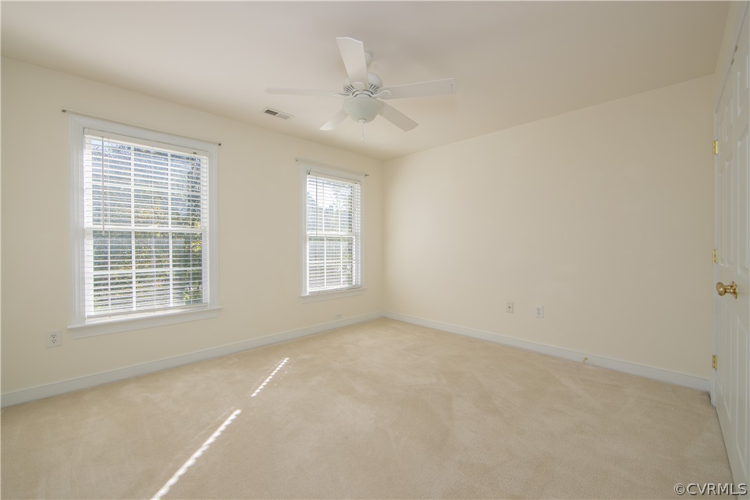 846 Club Ridge Terrace Chester, VA 23836 - Photo 18 of 35 an empty room with windows and closet