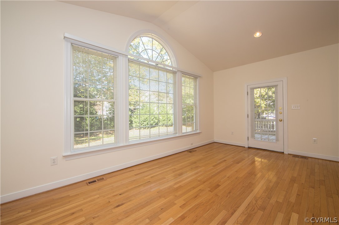 846 Club Ridge Terrace Chester, VA 23836 - Photo 7 of 35 an empty room with wooden floor and windows