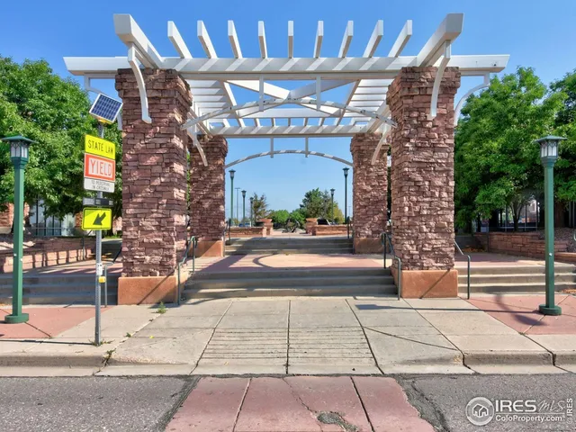 a front view of a building with street view