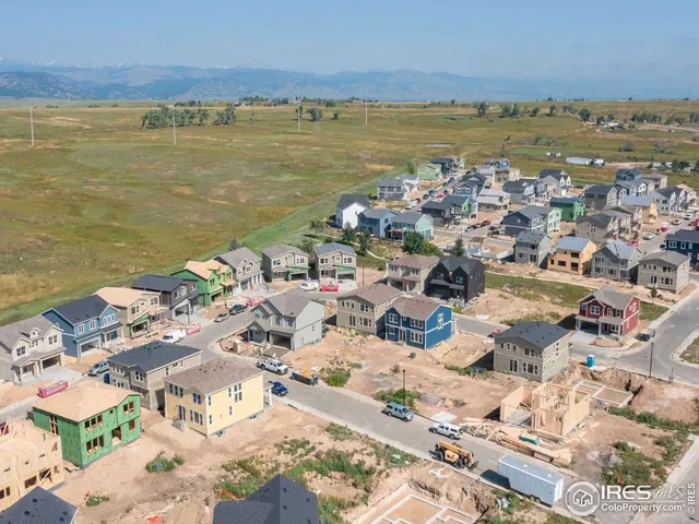 a view of a city with an ocean beach