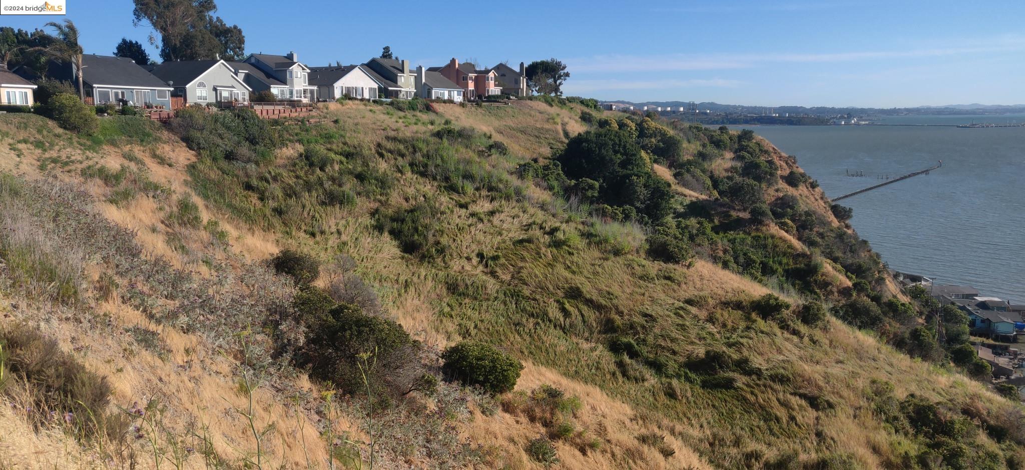 199 Sandy Beach Road Vallejo, CA 94590 - Photo 6 of 13 a view of a houses with a trees