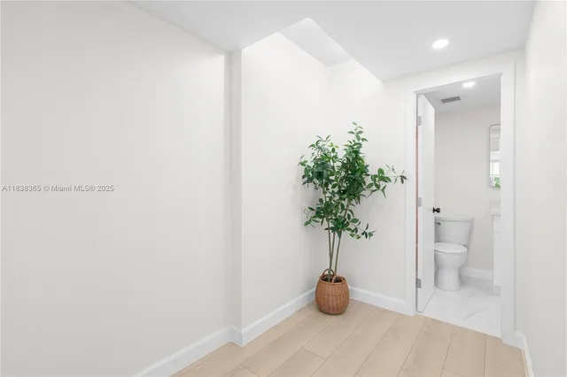 a view of a potted plant in a bathroom