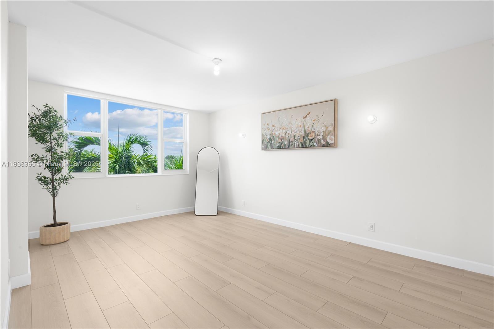 4400 Hillcrest Drive, Unit 314B Hollywood, FL 33021 - Photo 18 of 25 a view of an empty room with a window