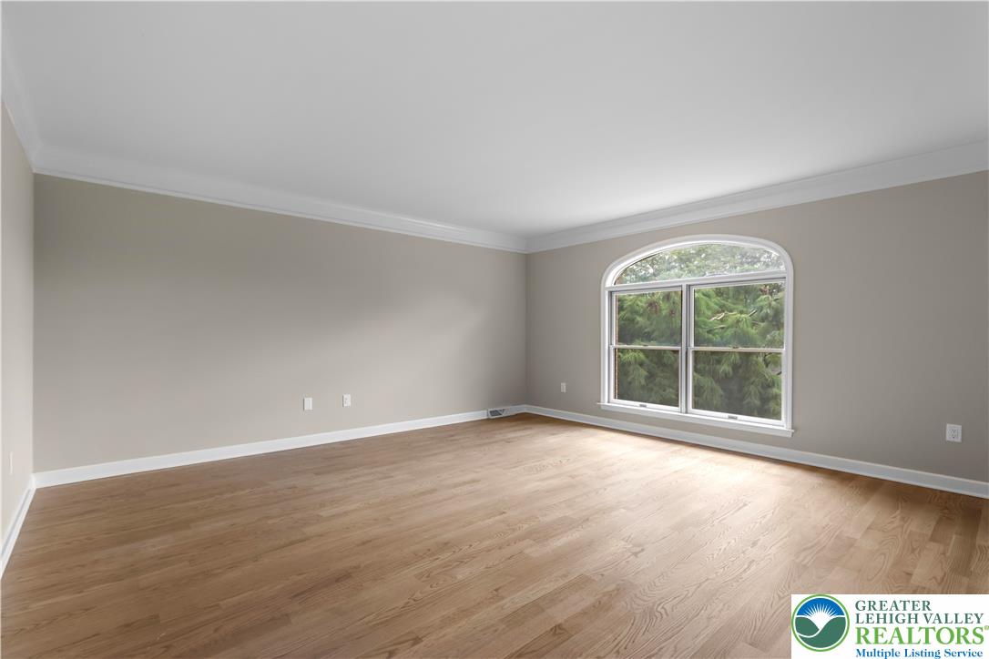 3685 Manor Road Bethlehem, PA 18020 - Photo 28 of 47 an empty room with wooden floor and windows