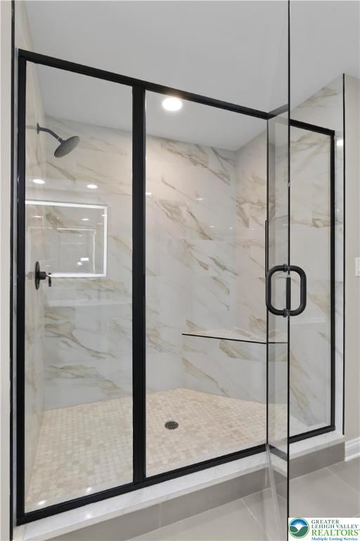 3685 Manor Road Bethlehem, PA 18020 - Photo 35 of 47 a bathroom with a glass shower door