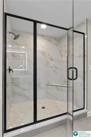 a bathroom with a sink and cabinets