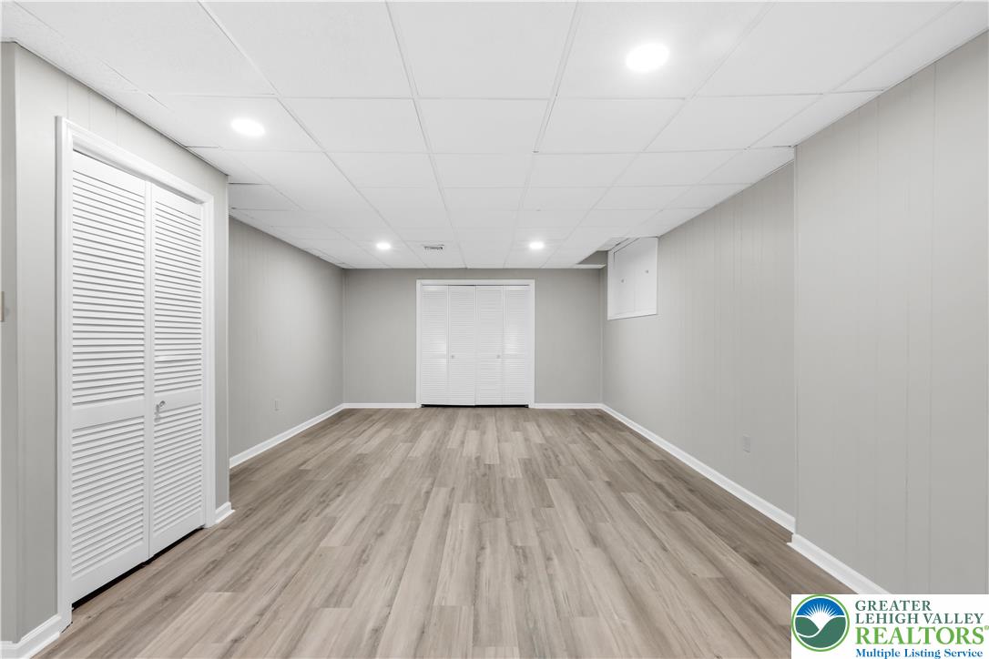 3685 Manor Road Bethlehem, PA 18020 - Photo 42 of 47 a view of an empty room with wooden floor and a window