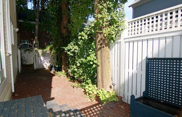 9 Camden Place Cambridge, MA 02138 - Photo 12 of 16 a view of a backyard