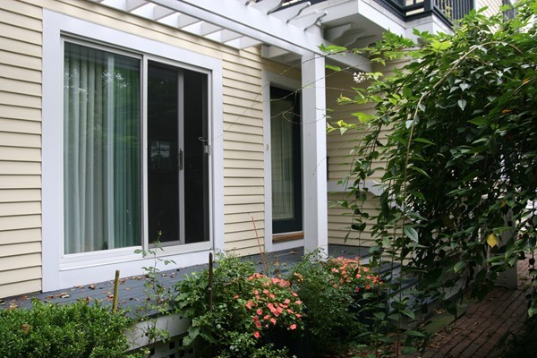 9 Camden Place Cambridge, MA 02138 - Photo 14 of 16 an entrance to house with yard and green space