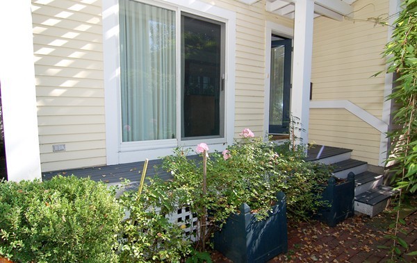 9 Camden Place Cambridge, MA 02138 - Photo 16 of 16 a front view of a house with a yard