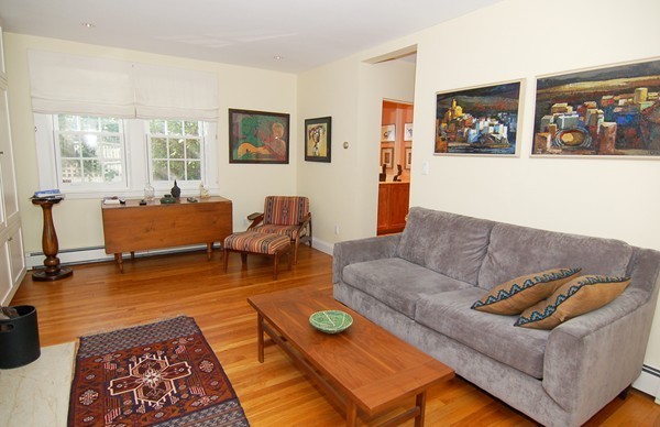 9 Camden Place Cambridge, MA 02138 - Photo 5 of 16 a living room with furniture and a rug