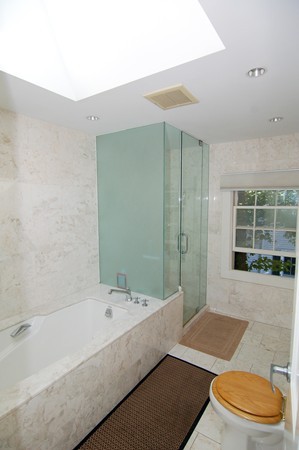 9 Camden Place Cambridge, MA 02138 - Photo 6 of 16 a bathroom with a sink a toilet and shower