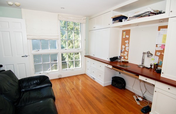 9 Camden Place Cambridge, MA 02138 - Photo 8 of 16 a room with furniture and a window