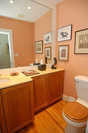 9 Camden Place Cambridge, MA 02138 - Photo 9 of 16 a bathroom with a granite countertop toilet sink and mirror