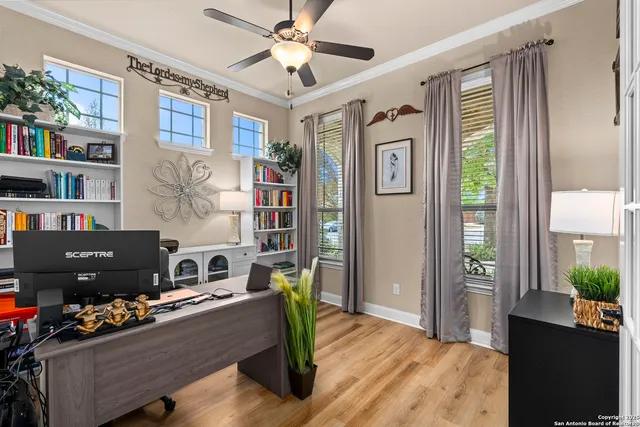 a view of living room with furniture and a flat screen tv