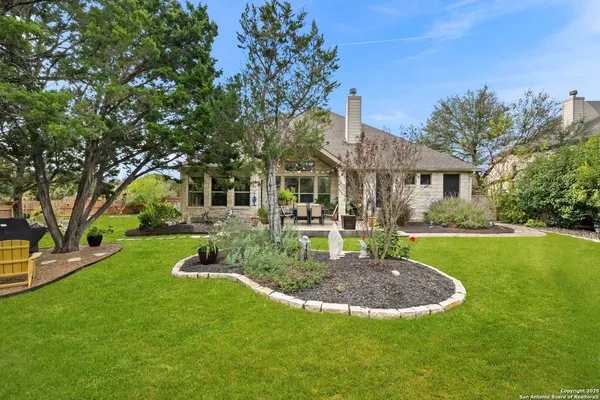a view of living room with furniture and a flat screen tv