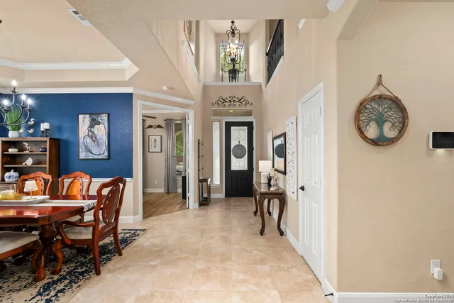 a kitchen with stainless steel appliances granite countertop wooden cabinets and a sink