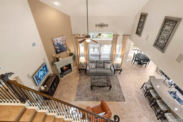a view of walk in closet with clothes