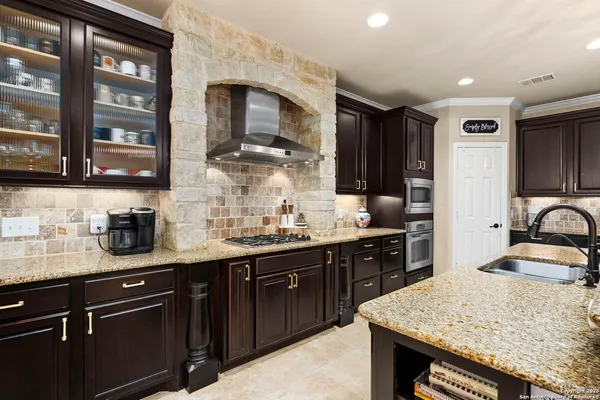 a bath room with a sink and a mirror