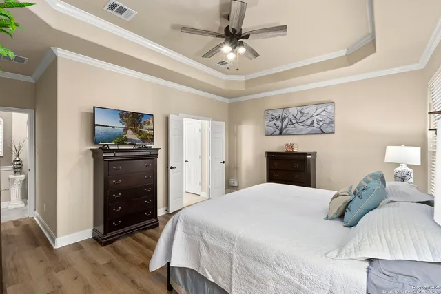 a view of a livingroom with furniture and hardwood floor