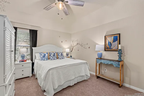 a view of a house with brick walls