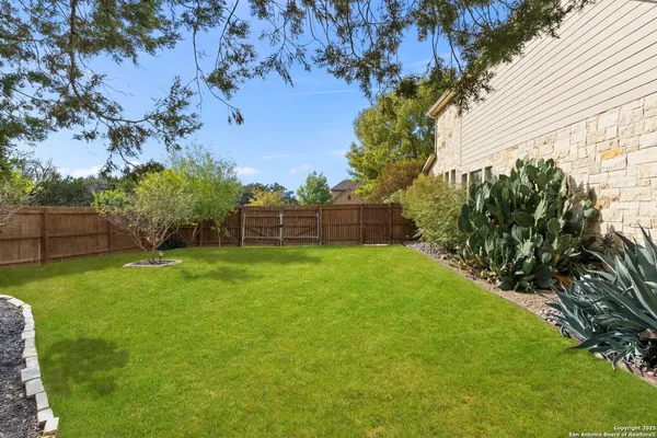 a view of a house with outdoor space and swimming pool