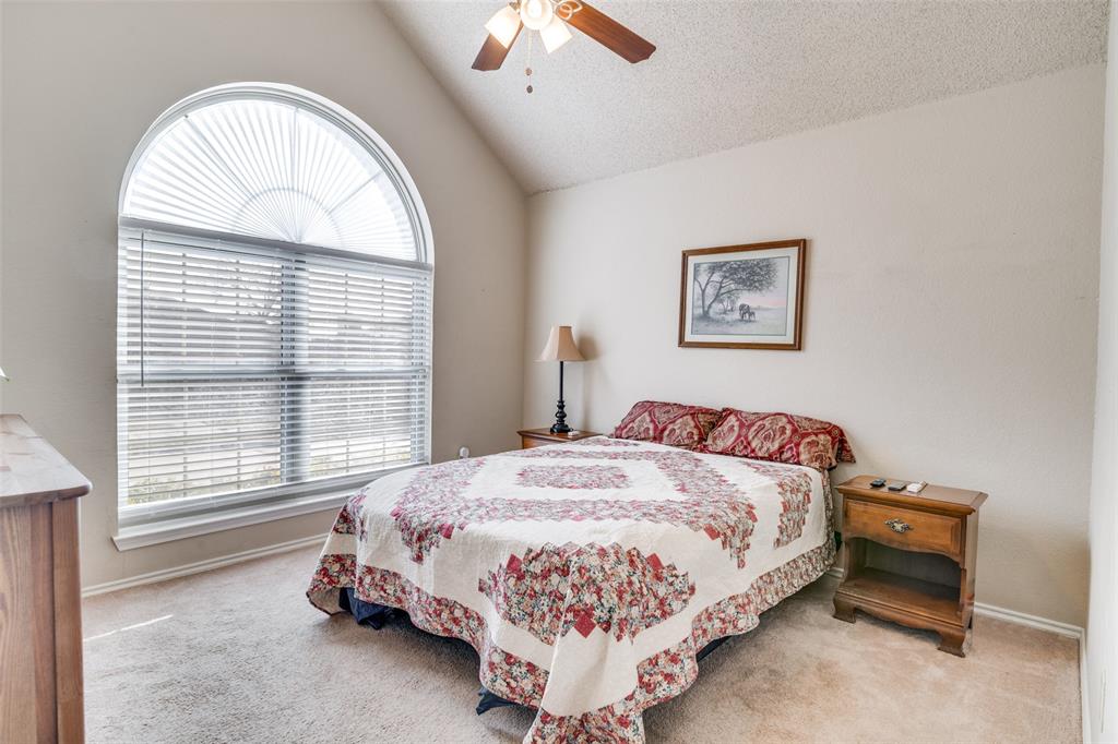 4201 Crystal Lane Garland, TX 75043 - Photo 23 of 33 a bedroom with a bed and a window