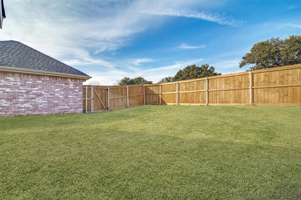 4201 Crystal Lane Garland, TX 75043 - Photo 33 of 33 a view of a backyard