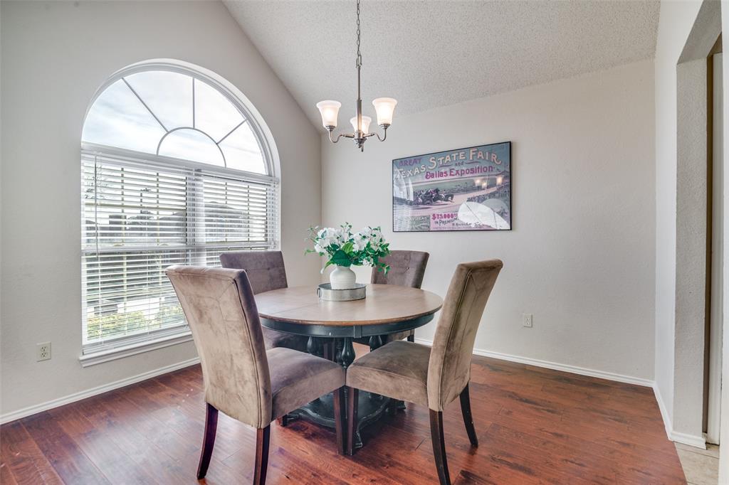 4201 Crystal Lane Garland, TX 75043 - Photo 4 of 33 a view of a dining room with furniture window and wooden floor