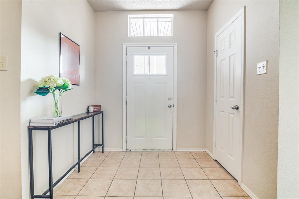4201 Crystal Lane Garland, TX 75043 - Photo 6 of 33 a view of an entryway with wooden floor