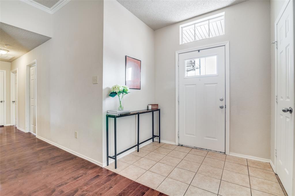 4201 Crystal Lane Garland, TX 75043 - Photo 7 of 33 a view of an entryway with wooden floor