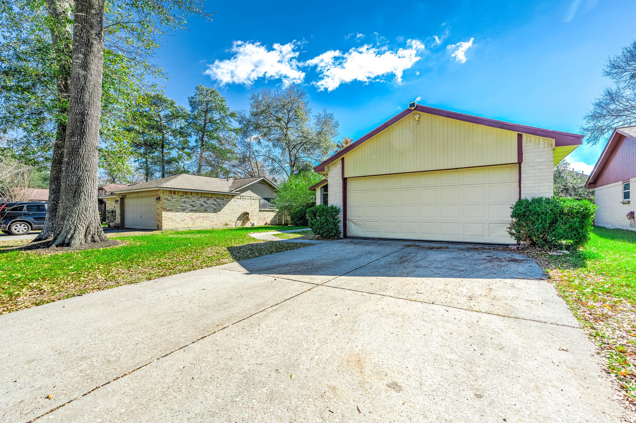 a view of a house with a yard