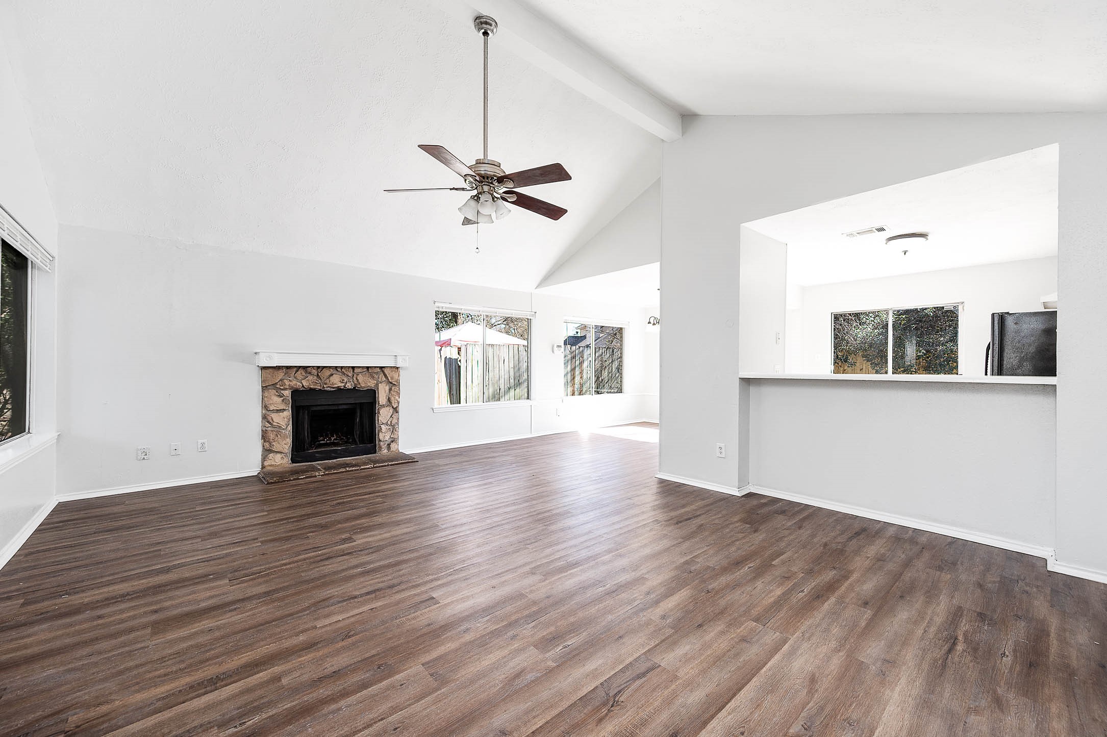 3423 Nutwood Lane Spring, TX 77389 - Photo 7 of 20 a view of an empty room with a fireplace and a window